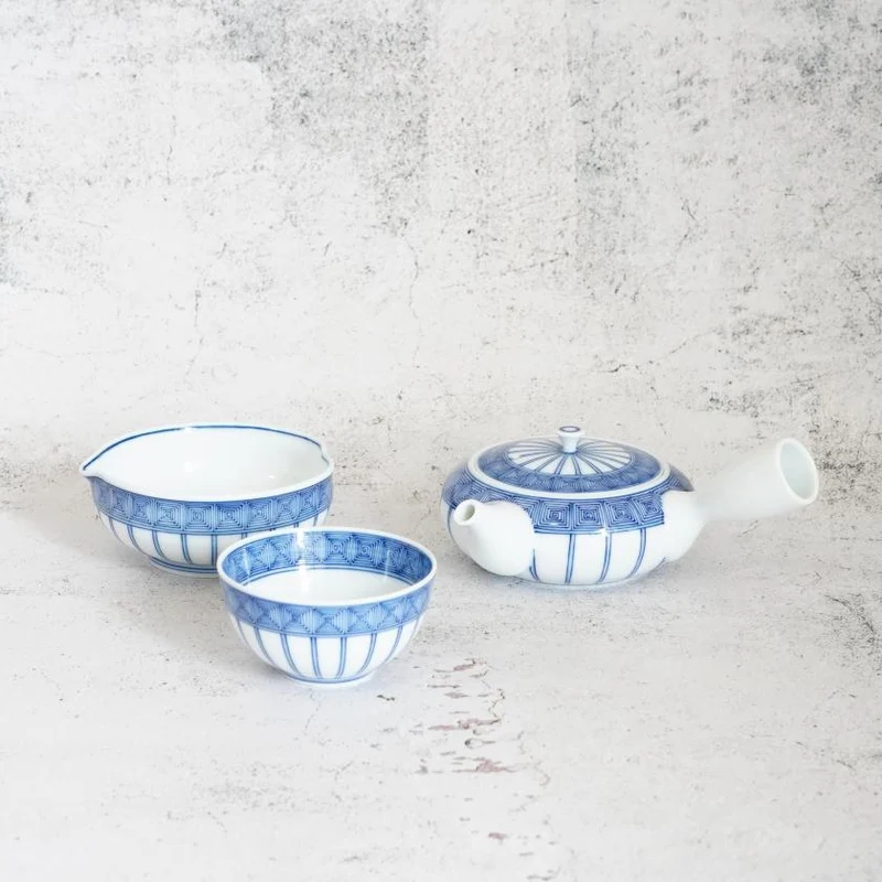 A Hirado Shozan kyusu, samashi and teacup with fine indigo decoration.
