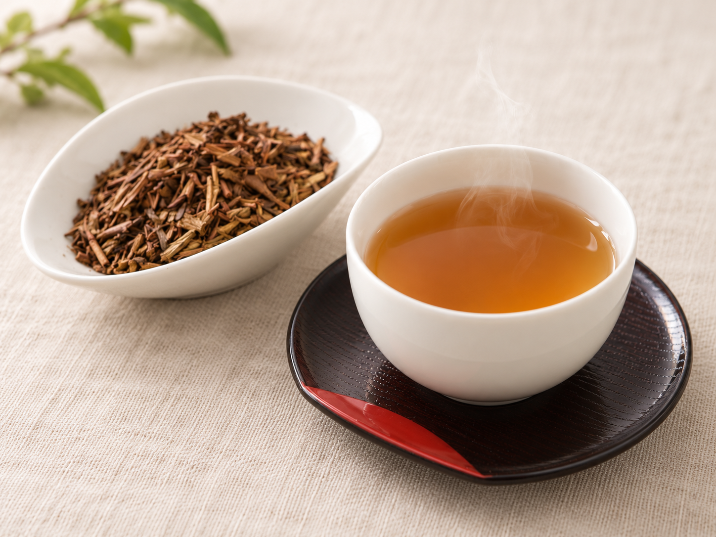 Cup of hojicha with roasted tea leaves.